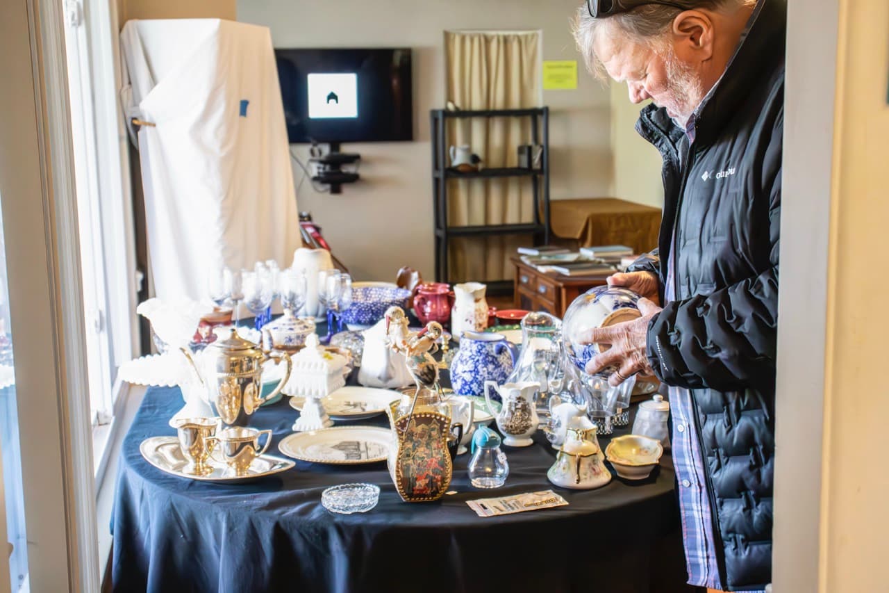 Table with many pieces of fine china